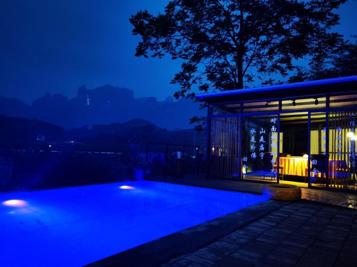 Tujia Folk Houses Чжанцзяцзе Экстерьер фото