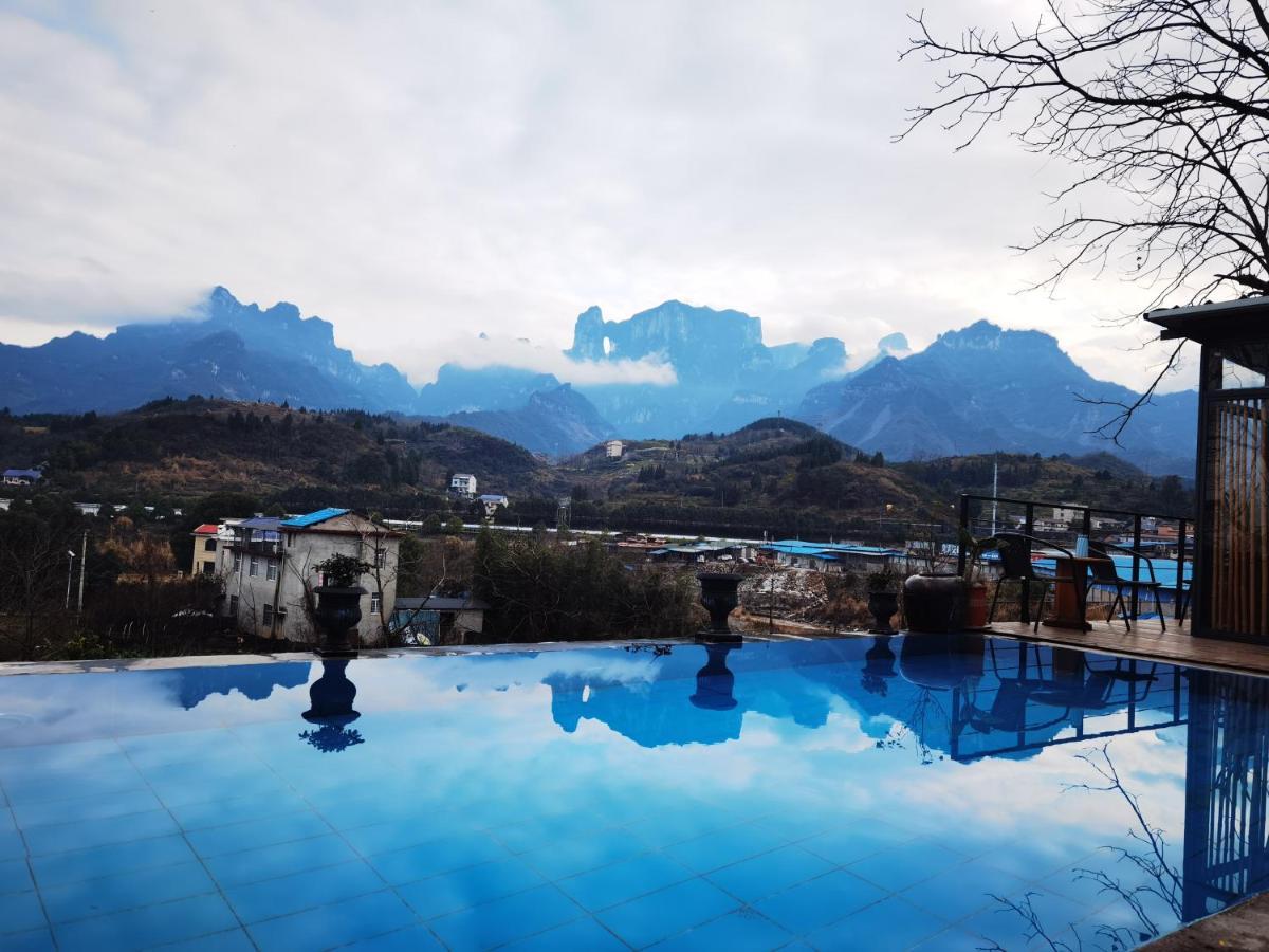 Tujia Folk Houses Чжанцзяцзе Экстерьер фото